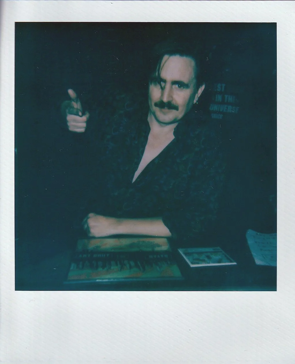 Eddie Argos of Art Brut at merch table at Mercury Lounge