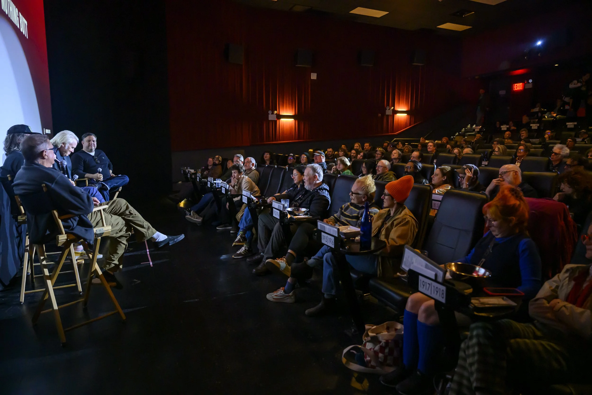 The panel and audience of "Butthole Surfers: The Hole Truth and Nothing Butt"