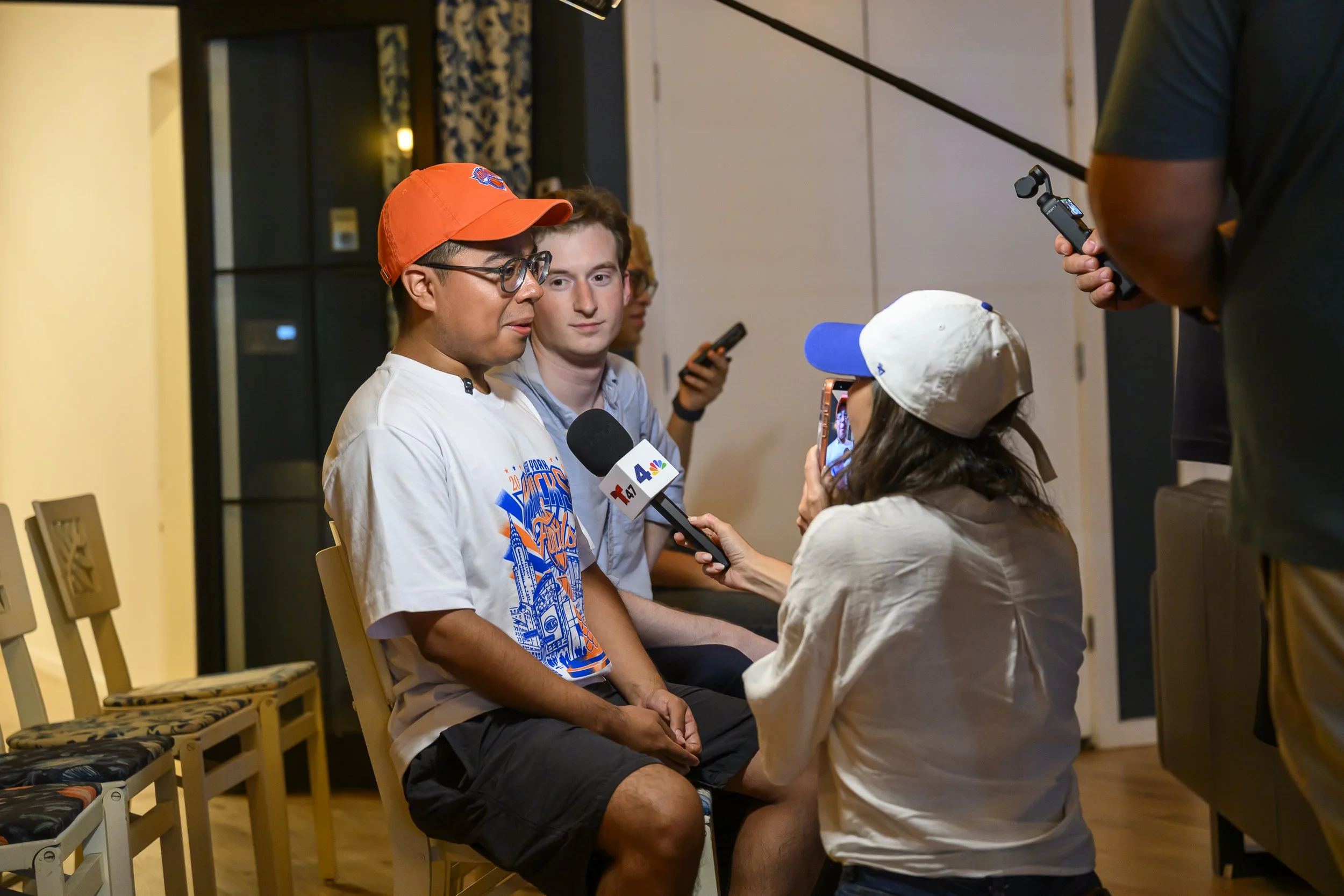 An attendee is interviewed by NBC New York