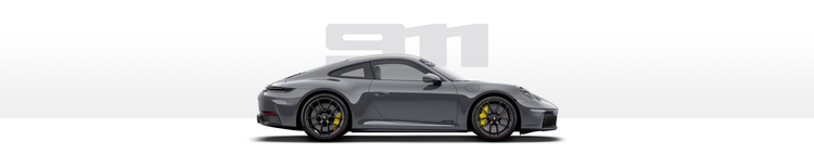 Gray Porsche sports car with black wheels and yellow brake calipers.