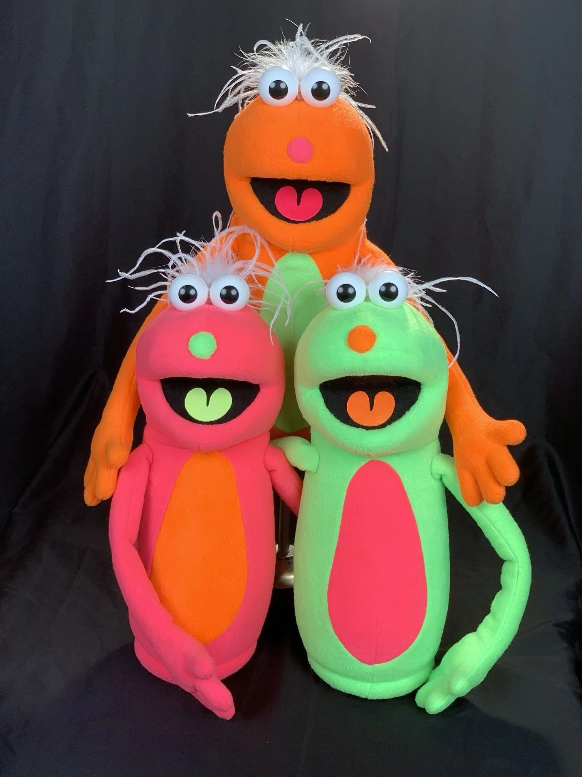 Meet the ROCK-ITS&trade; 🧡💚🩷

These black light puppets are designed with performance in mind. Standing in at 16&rdquo; high, they&rsquo;re LIGHTWEIGHT! No more tired arms with heavy puppets. You&rsquo;ll enjoy the ease of using these characters!
