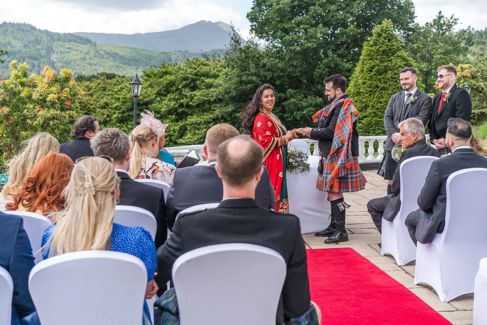 Couple getting married with Ben Lomond backdrop at Forest Hills, by Loch Ard, Trossachs