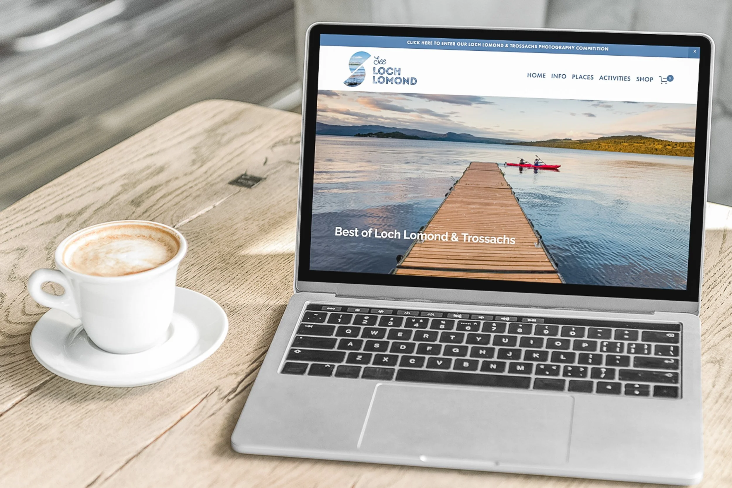 See Loch Lomond website with cup of coffee