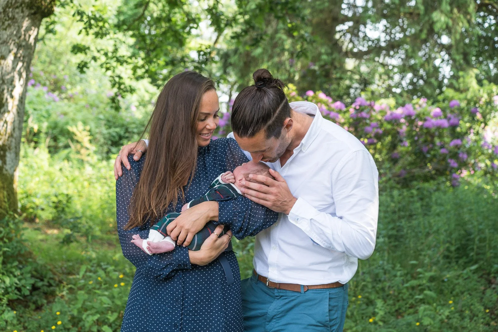 Young couple with their baby on a photography session at Cameron House Hotel by local photographer Paul Saunders