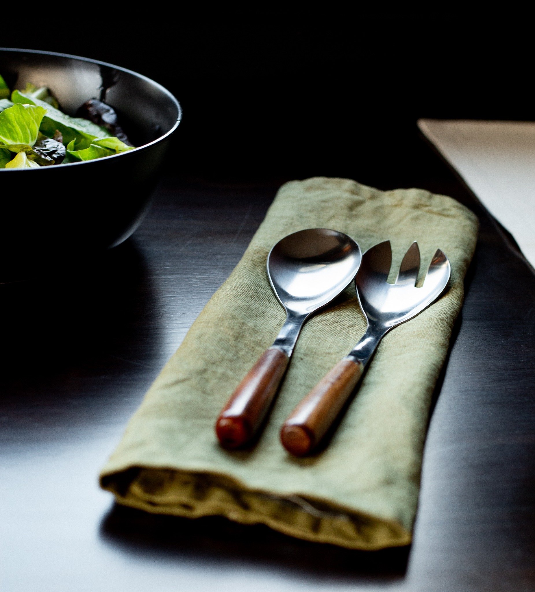 Our salad servers are a stylish and functional accessory for anyone who loves to entertain or simply enjoys a well-presented meal. 

Made from high-quality acacia wood and stainless steel, these servers are both durable and easy to clean, making them