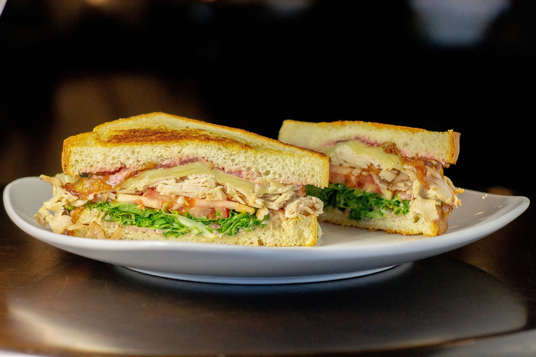 🥪 NEW SANDWICH 🥪

Introducing the SMOKED TURKEY CLUB, layered with house-smoked turkey, bacon, lettuce, tomato, cheddar cheese &amp; cranberry mayo, served on perfectly-toasted sourdough. It's like Thanksgiving in the summertime!