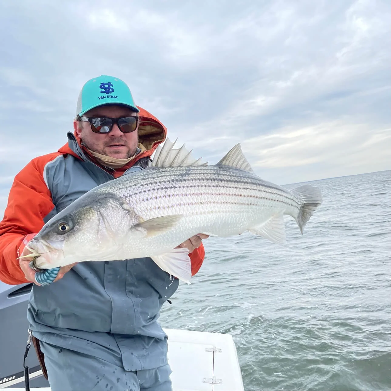 Capt. Tom Kosinski holding a fish