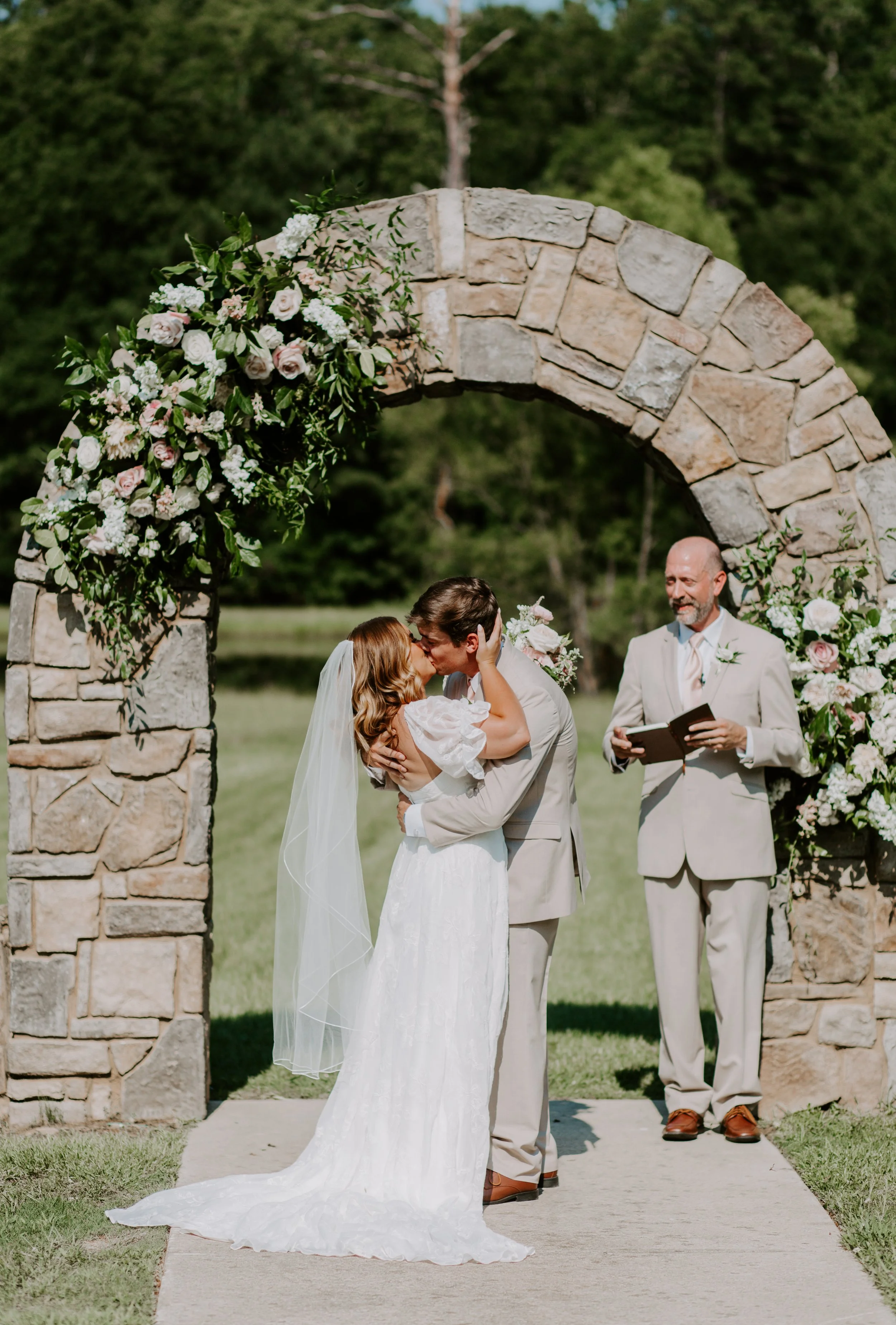 married+kiss+stone+arch+flower+floral+decor