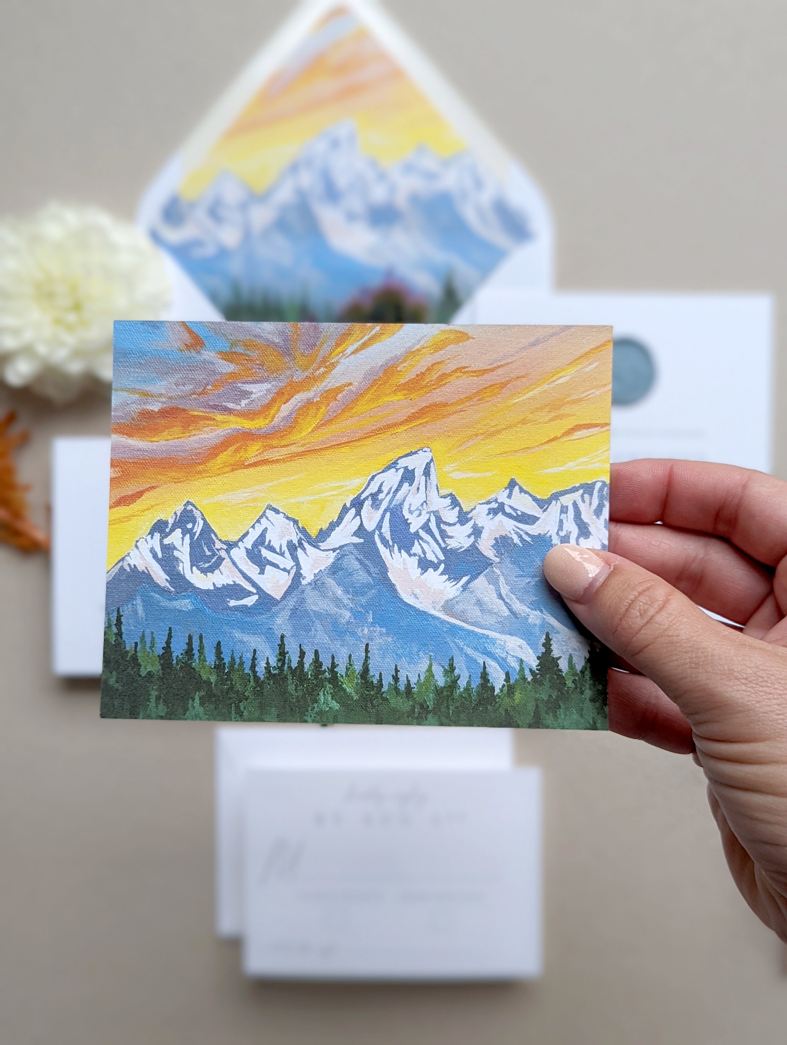 mountain wedding invitation with vibrant colors
