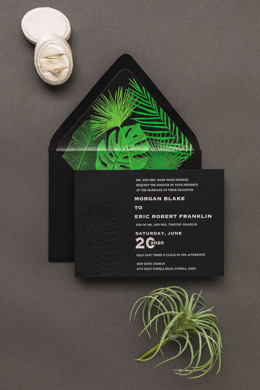 modern tropical wedding invitation with black and green