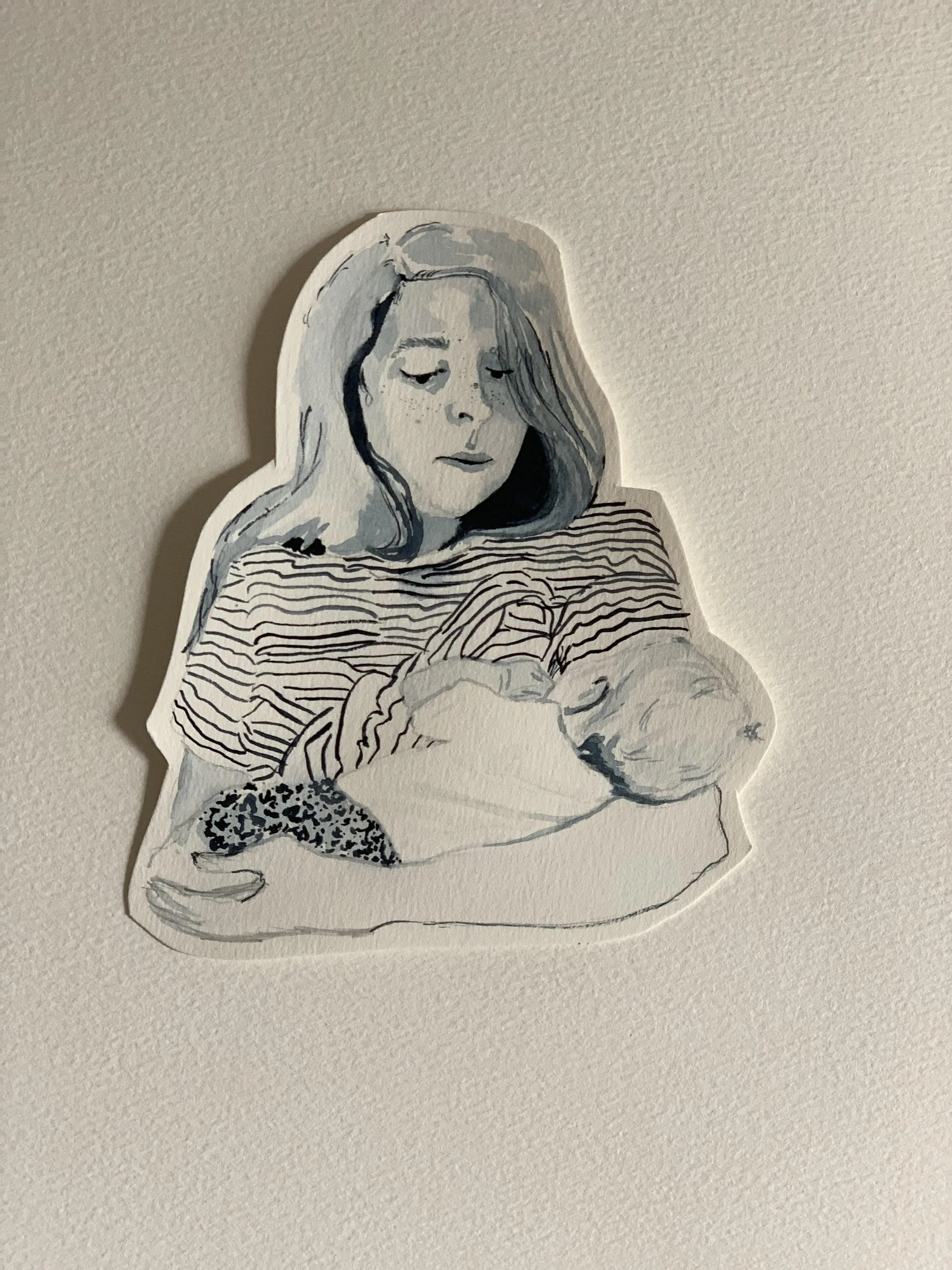 Watercolor portrait of a woman holding her baby and nursing her. It is all in blue watercolor.