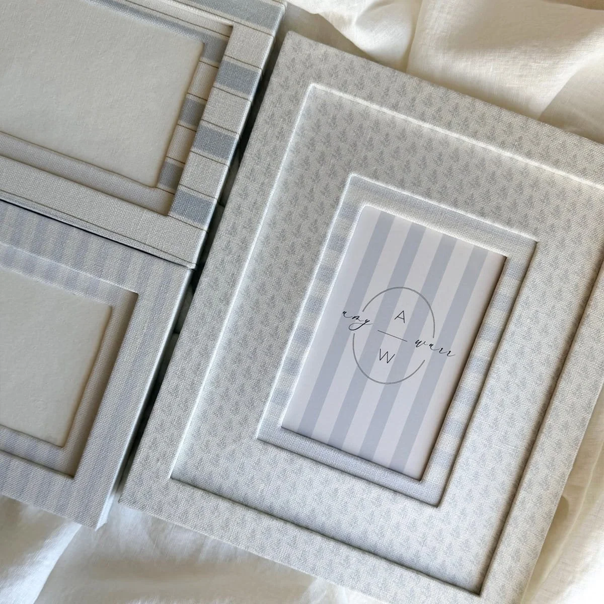 Fabric covered picture frames in linen by Amy Warr textiles