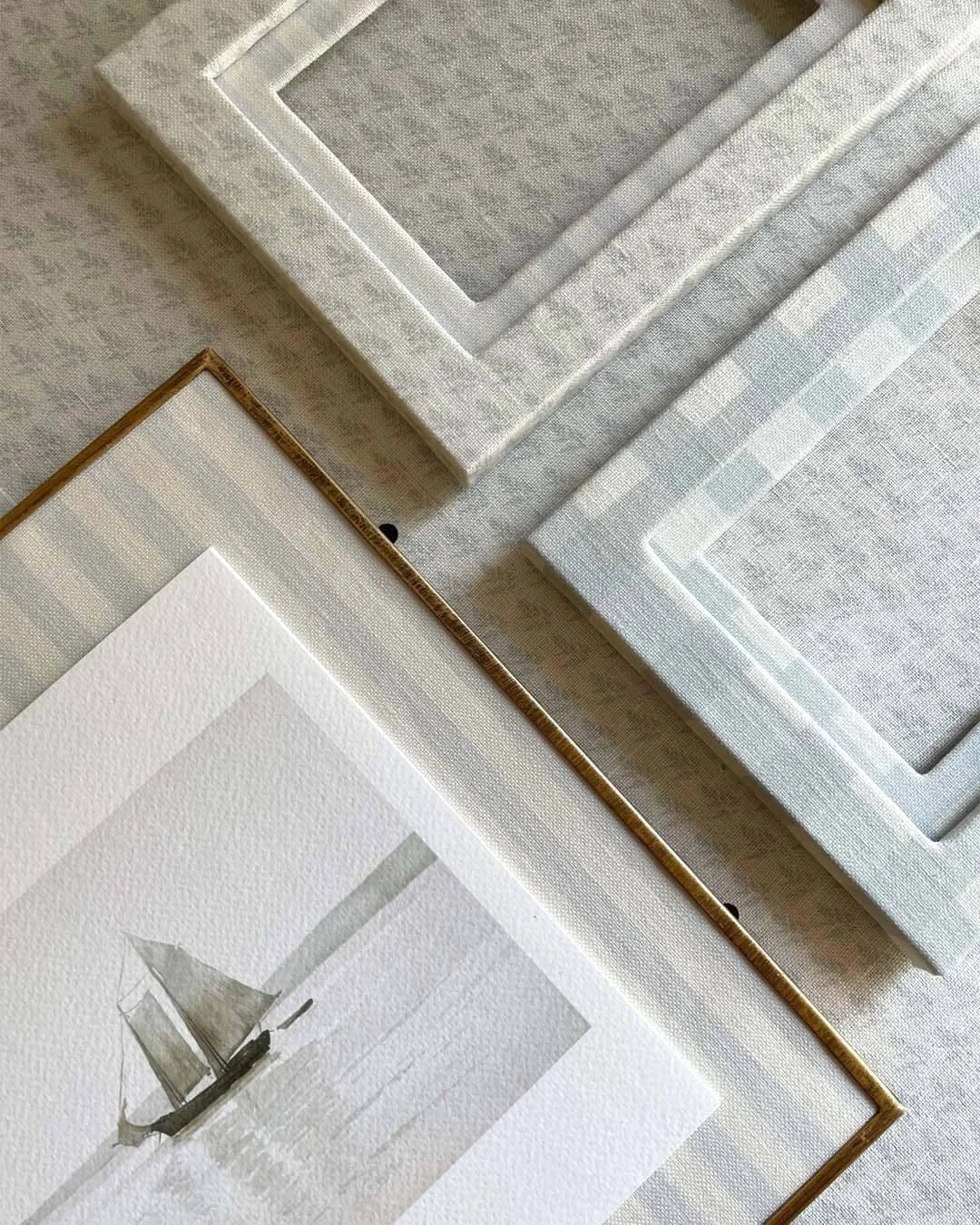 Fabric covered frames in Amy Warr striped and gingham linen 