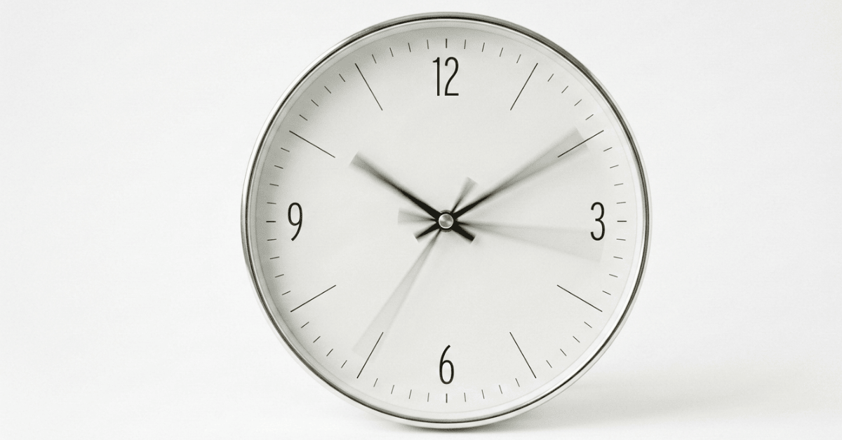 picture of a clock with blurred hands as if to show time is valuable and going by quickly