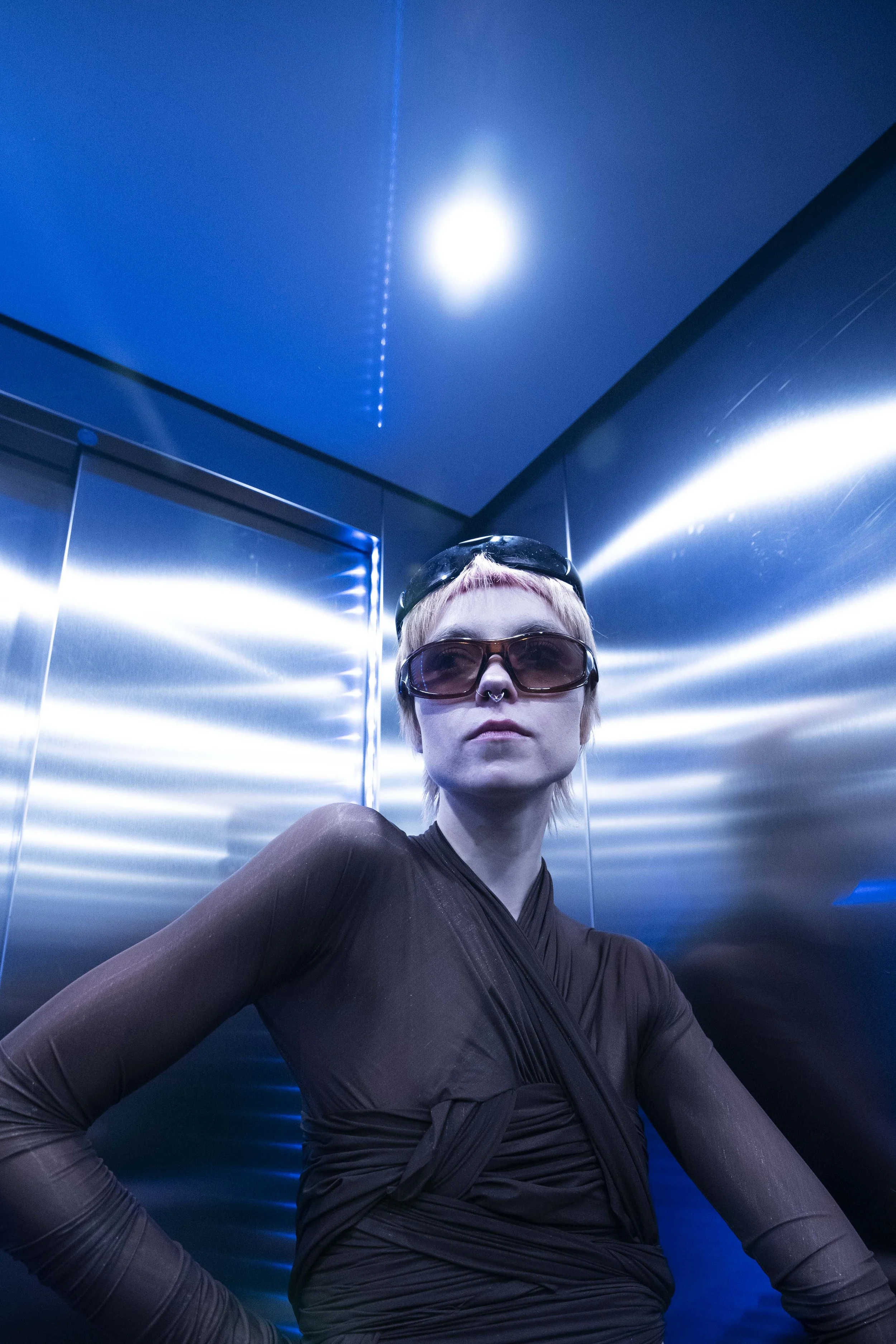 Glasses, Stylist's Own; Top, Alexander Wang at Brown Thomas; Skirt, Alexander Wang at Brown Thomas. 