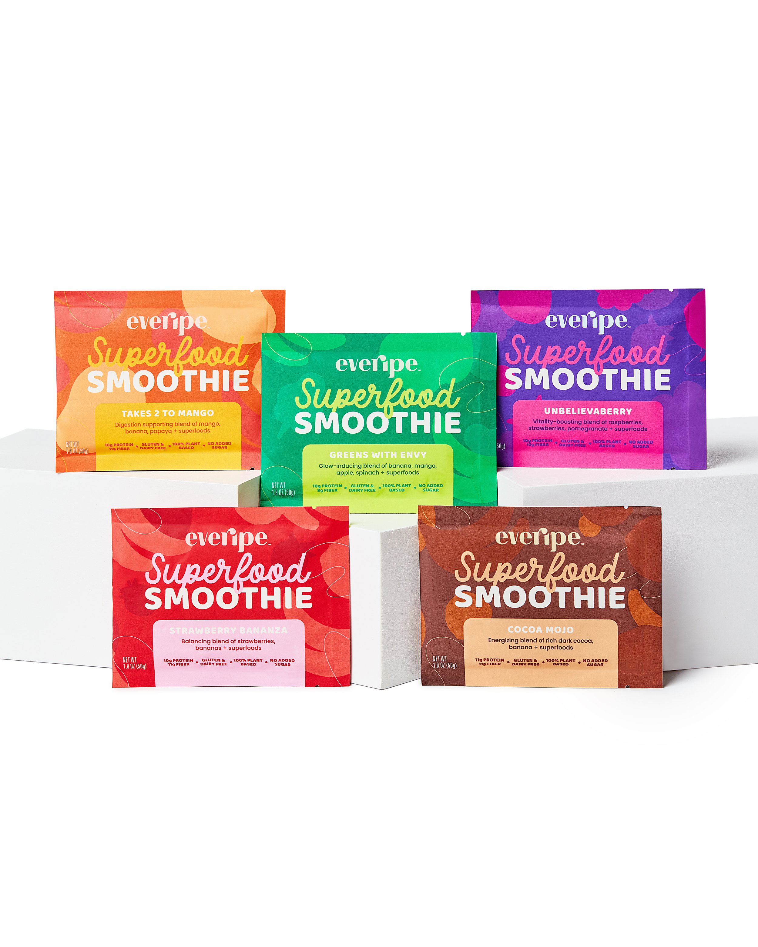 Five Everipe Superfood Smoothie packets in various flavors including "Takes 2 to Mango," "Unbelievaberry," "Greens With Envy," "Strawberry Bananza," and "Cocoa Mojo," arranged on a white background.