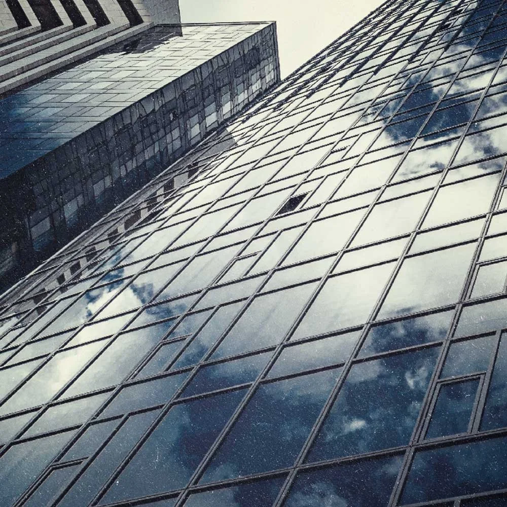 Gray and blue image of a buildint