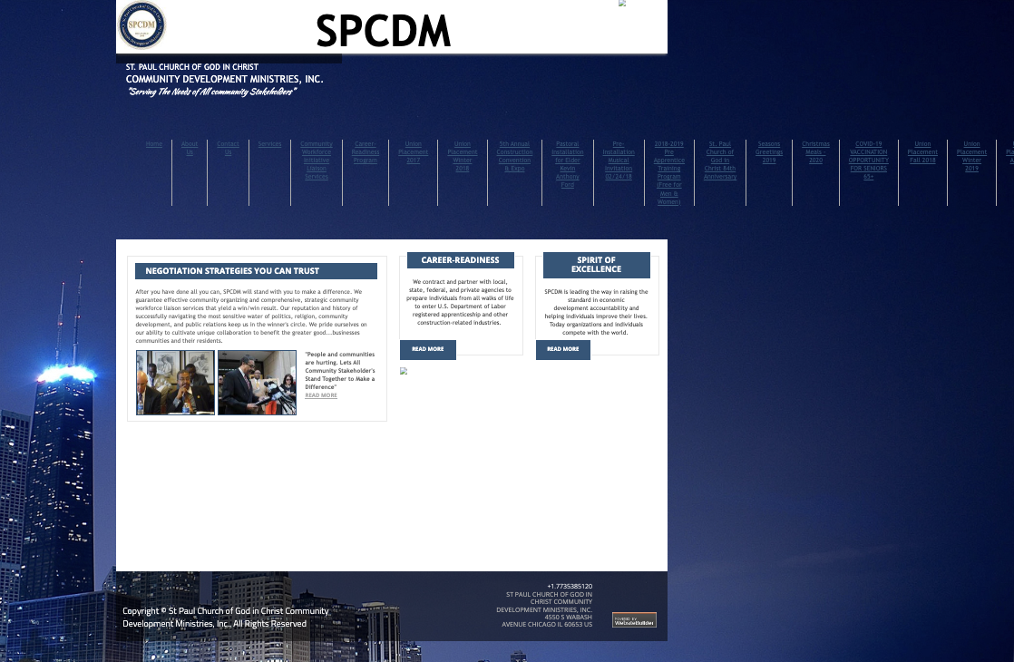 Website with SPCDM logo, three information boxes, city skyline background, and navigation text at the top.
