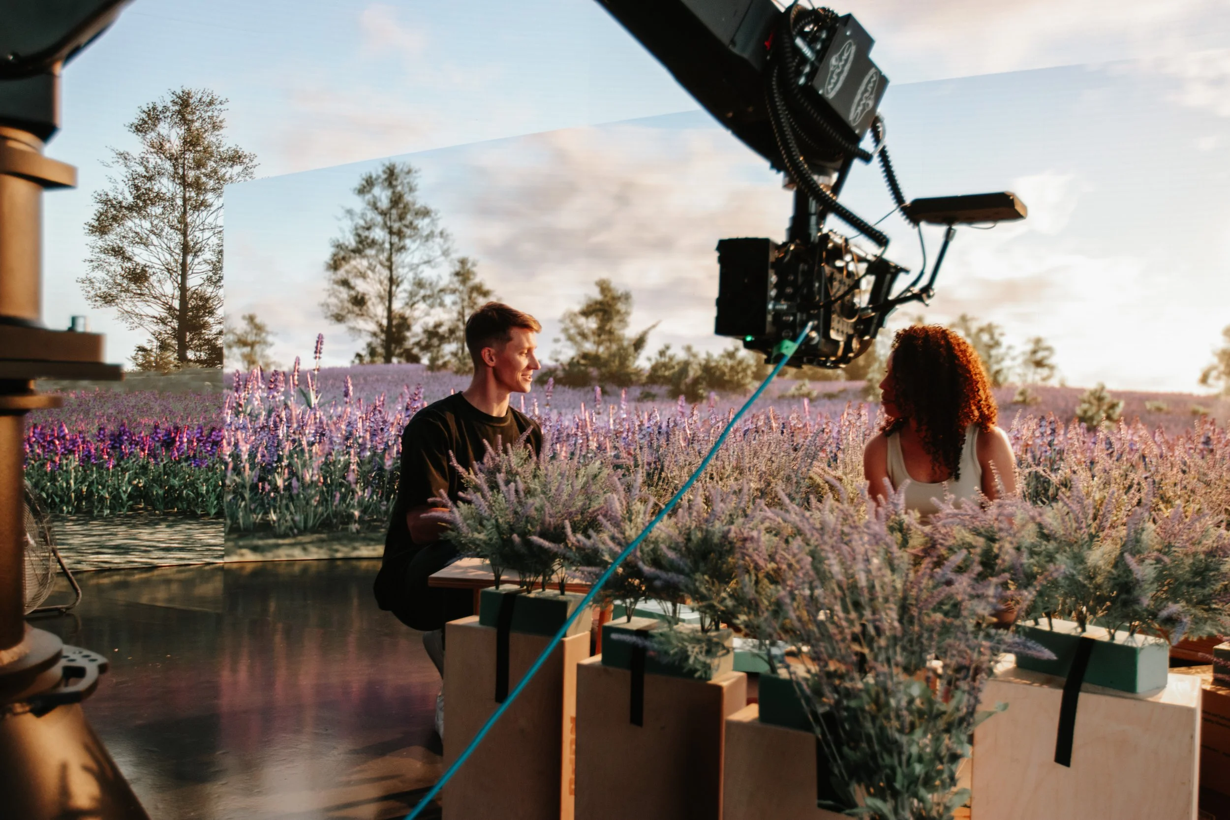 Extended reality environment shoot filmed on LED volume stage with virtual background in lavender field using bolt cinema highspeed robot