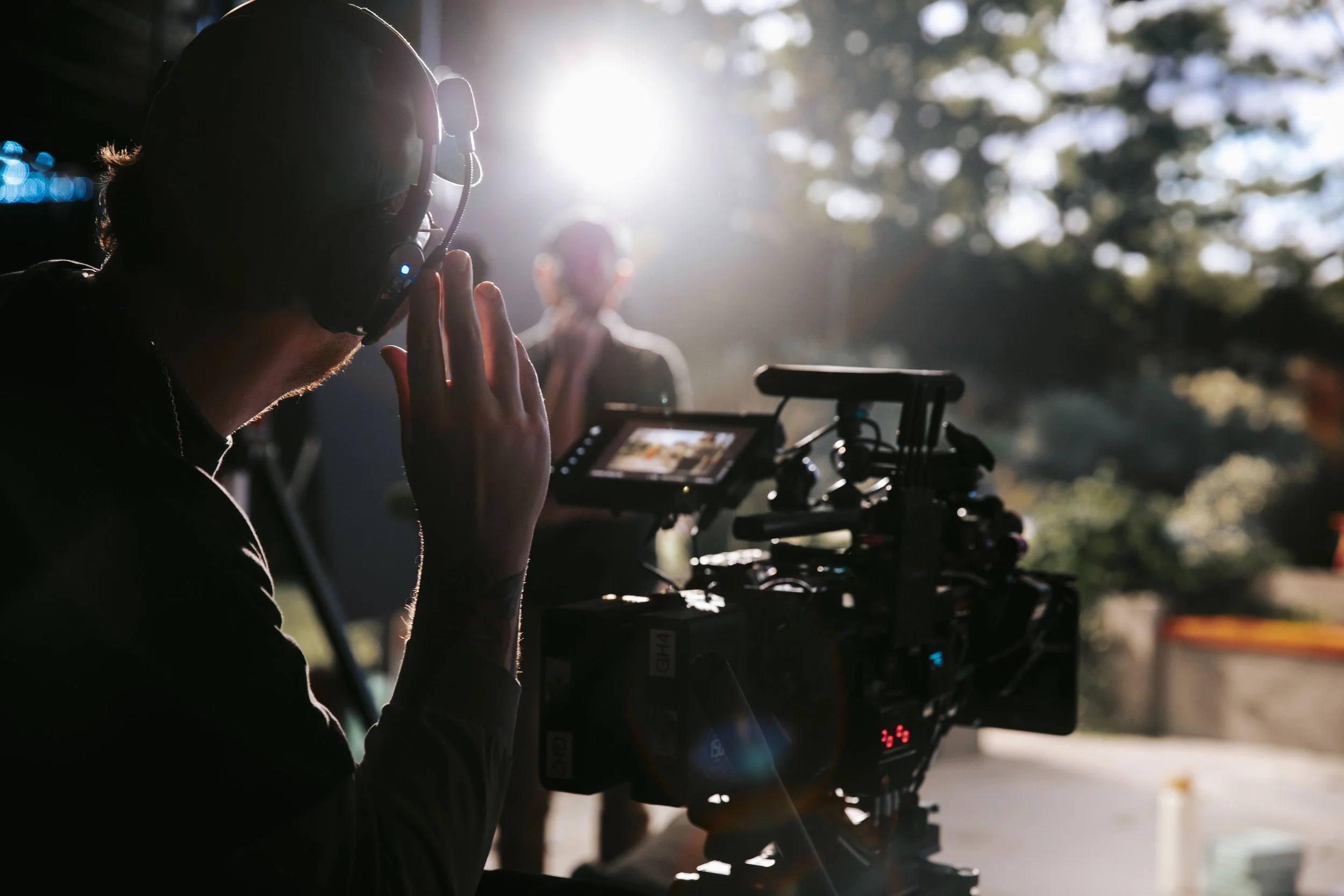 Video production filming setup with camera operator at Golden Hour studio in Michigan