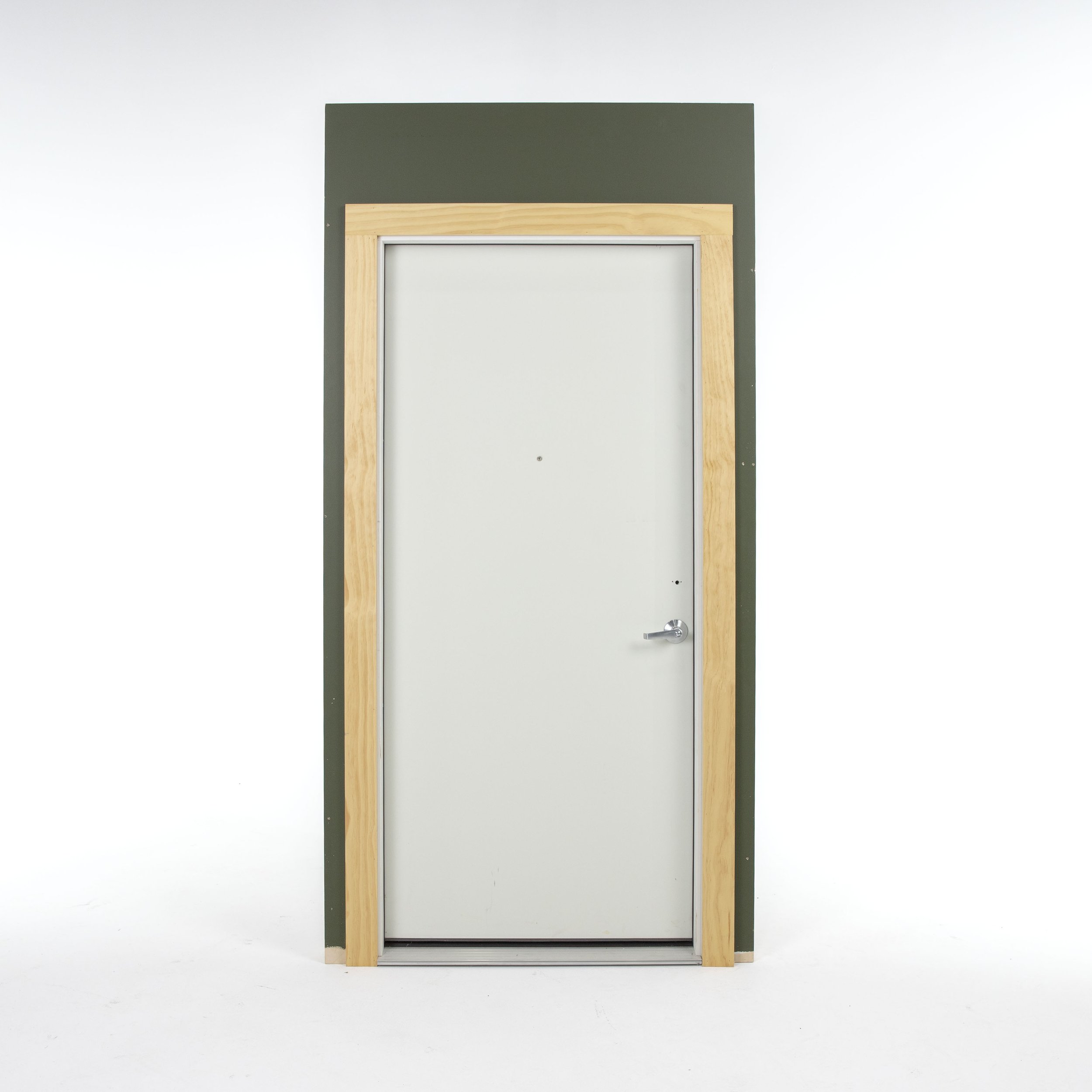 Metal Front Door in Wall