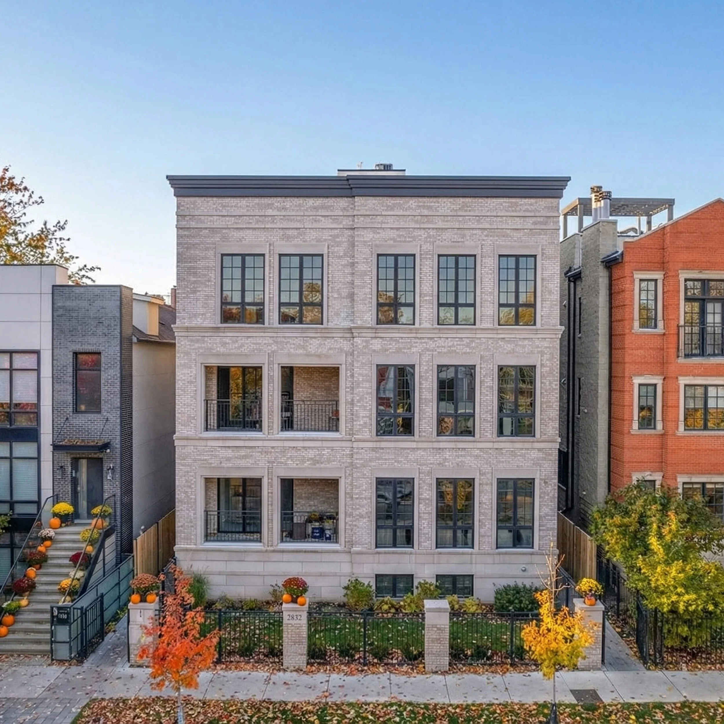 New construction Chicago limestone multi-unit building representing urban redevelopment and property private sales
