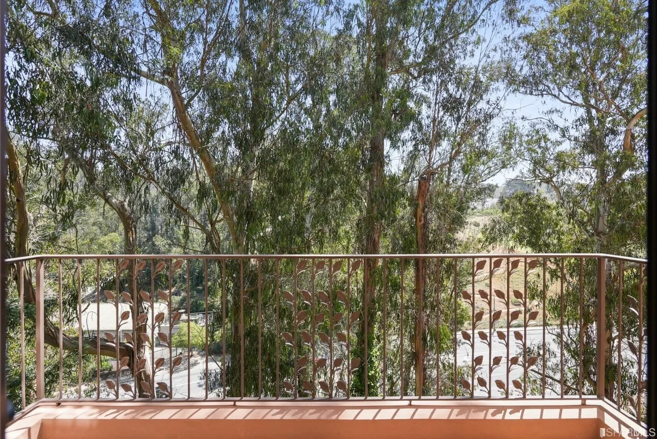 Bay Area home deck with treetop views and a clean, modern exterior feel, residential deck with treetop views — San Francisco Bay Area general contractor.