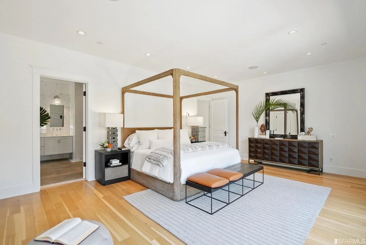 Bedroom remodel with canopy bed, fresh finishes, and hardwood flooring — San Francisco Bay Area general contractor.