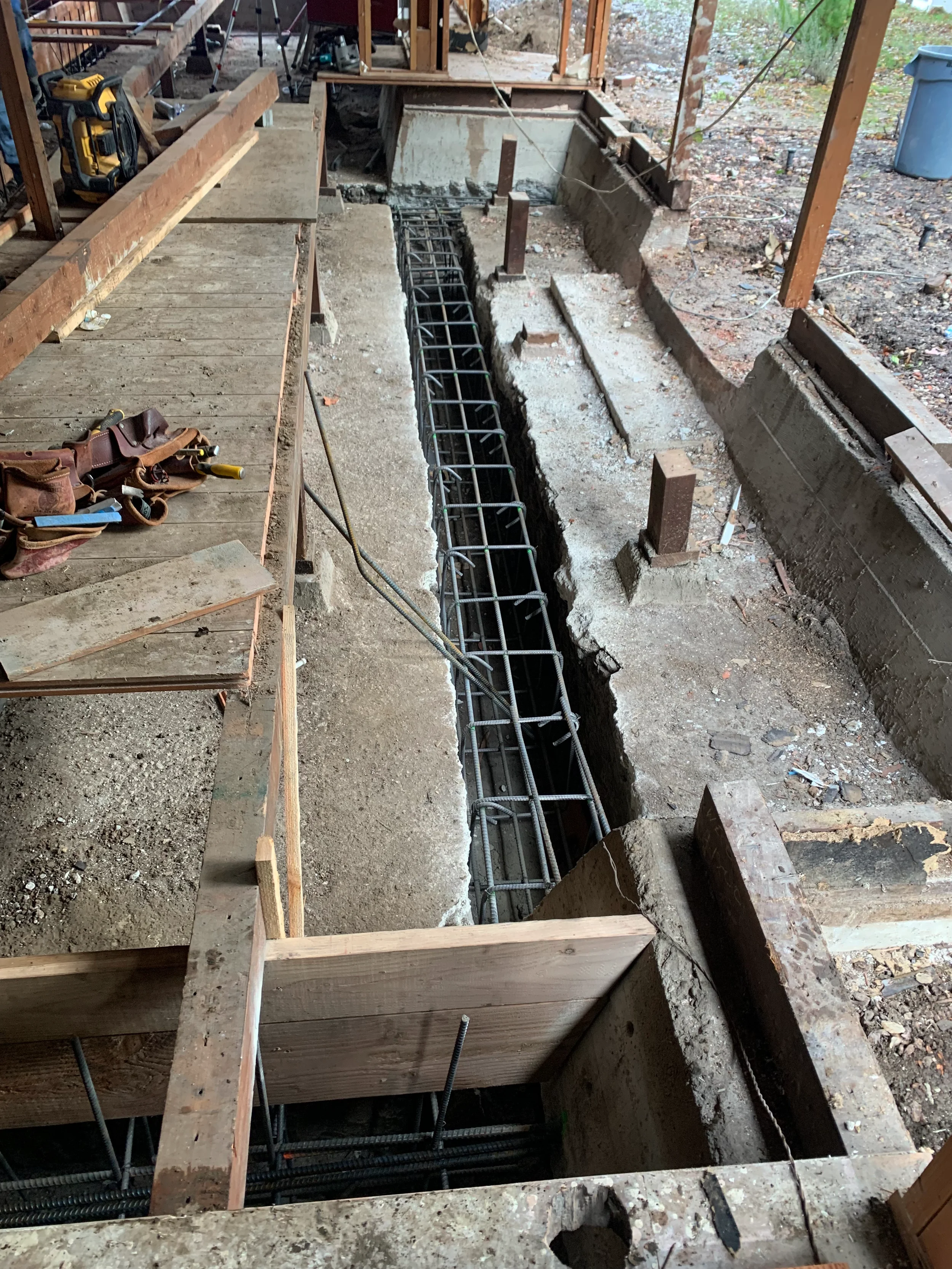 metal foundation upgrade below home—SF Pinnacle General Contractor