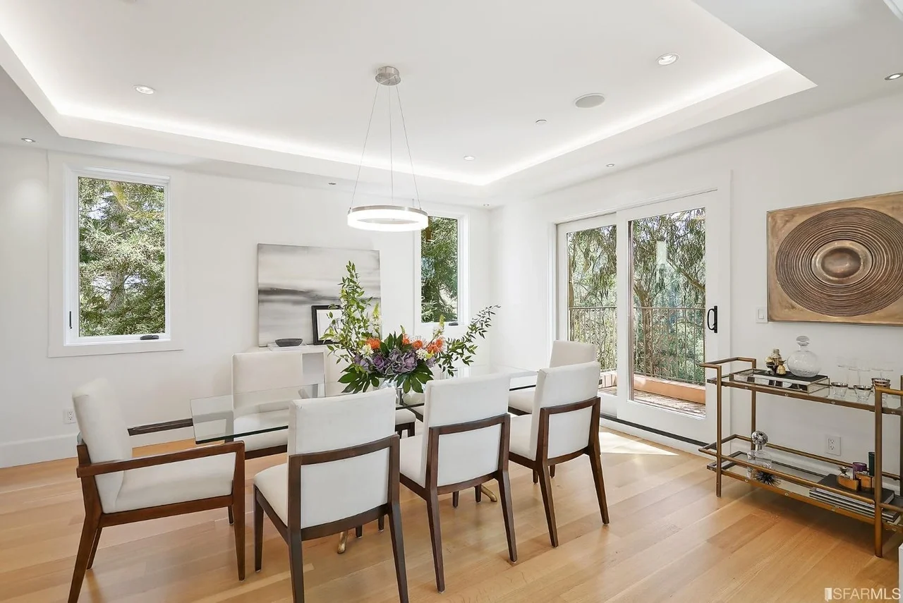 Dining room refresh with recessed lighting, wide-plank hardwood floors, and an open layout — San Francisco Bay Area general contractor.
