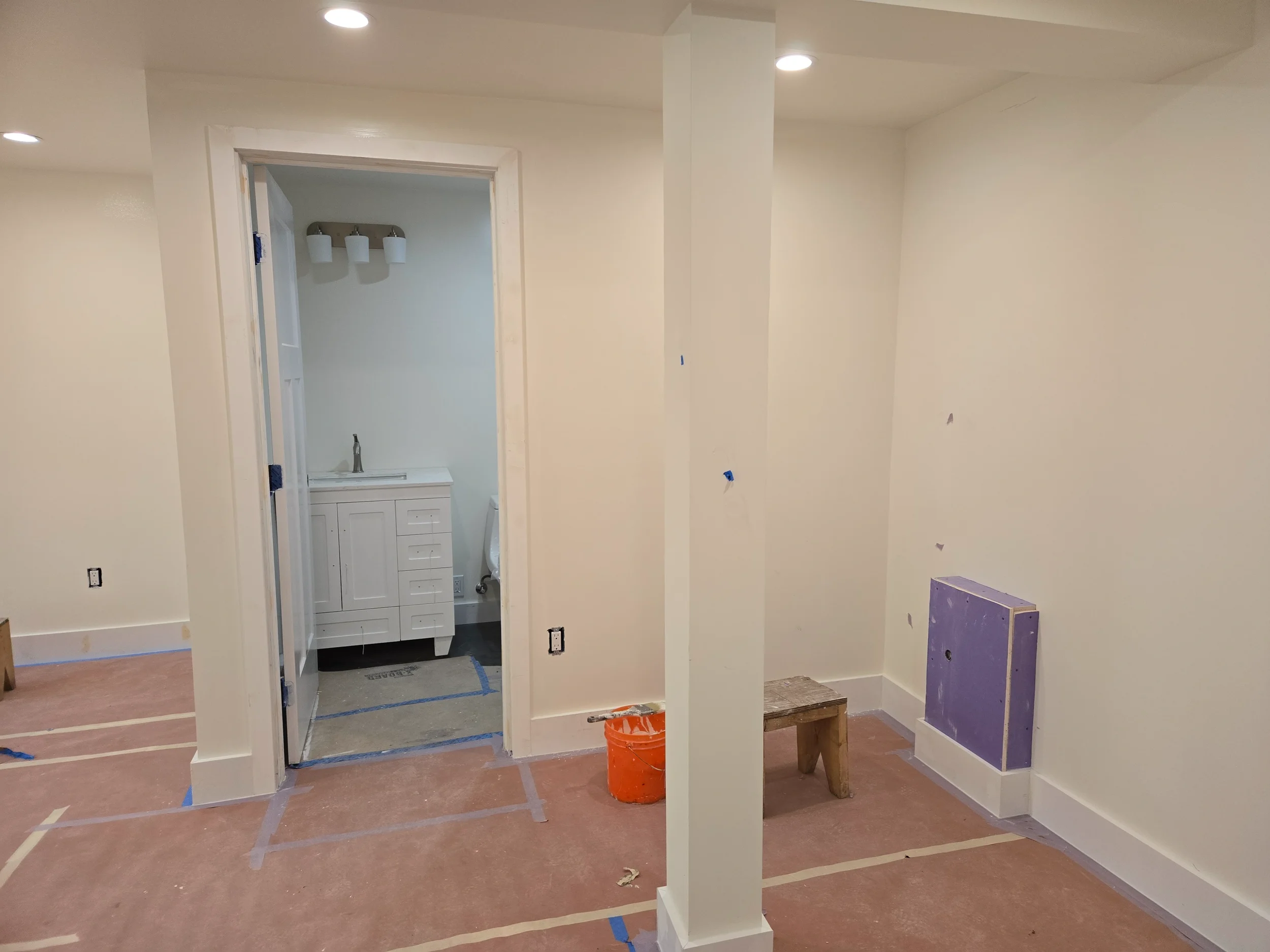 Ground-floor bathroom rough-in during conversion with new plumbing and wall prep — San Francisco Bay Area general contractor