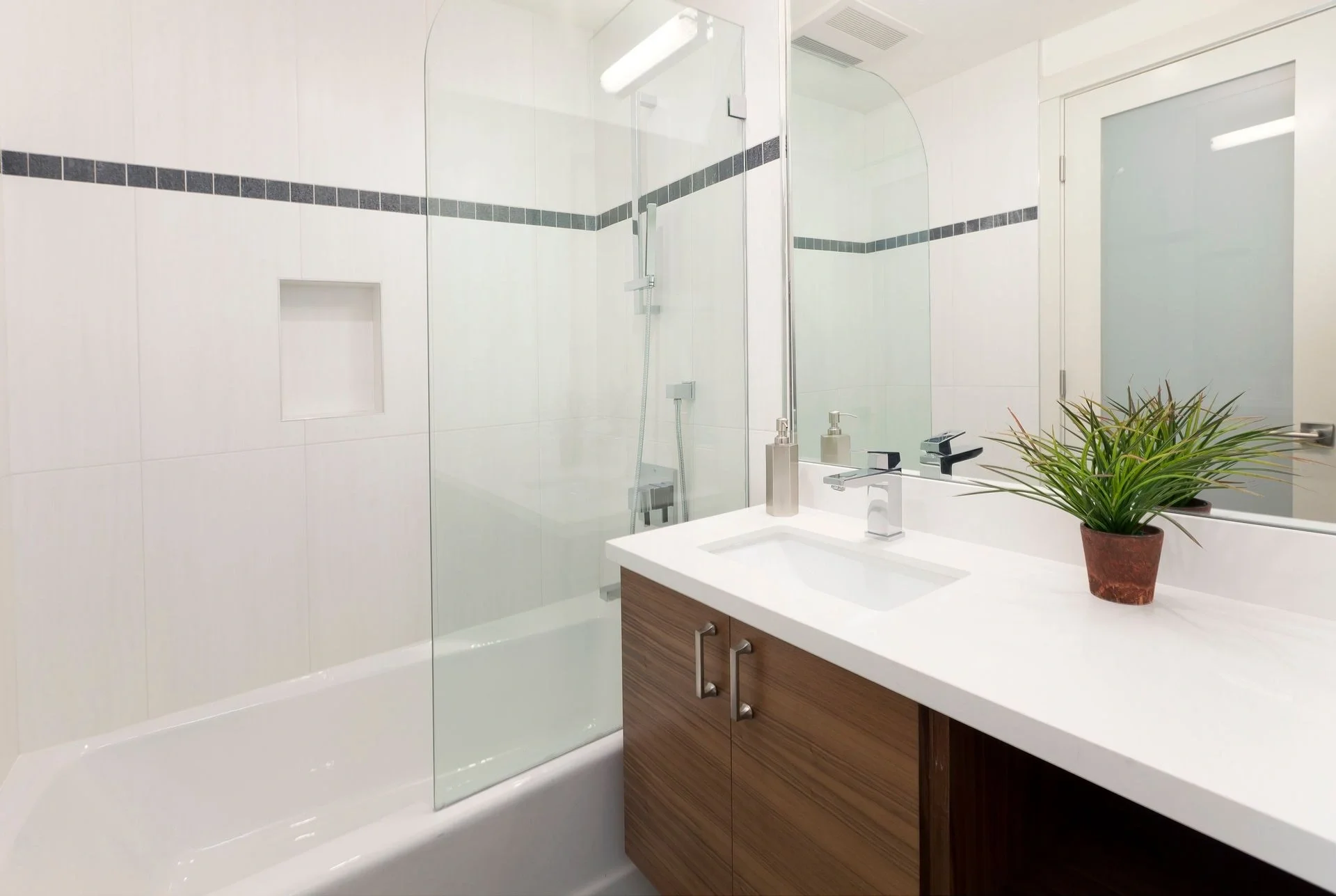 Bathroom renovation with updated vanity, bright tile, and modern fixtures — San Francisco Bay Area general contractor