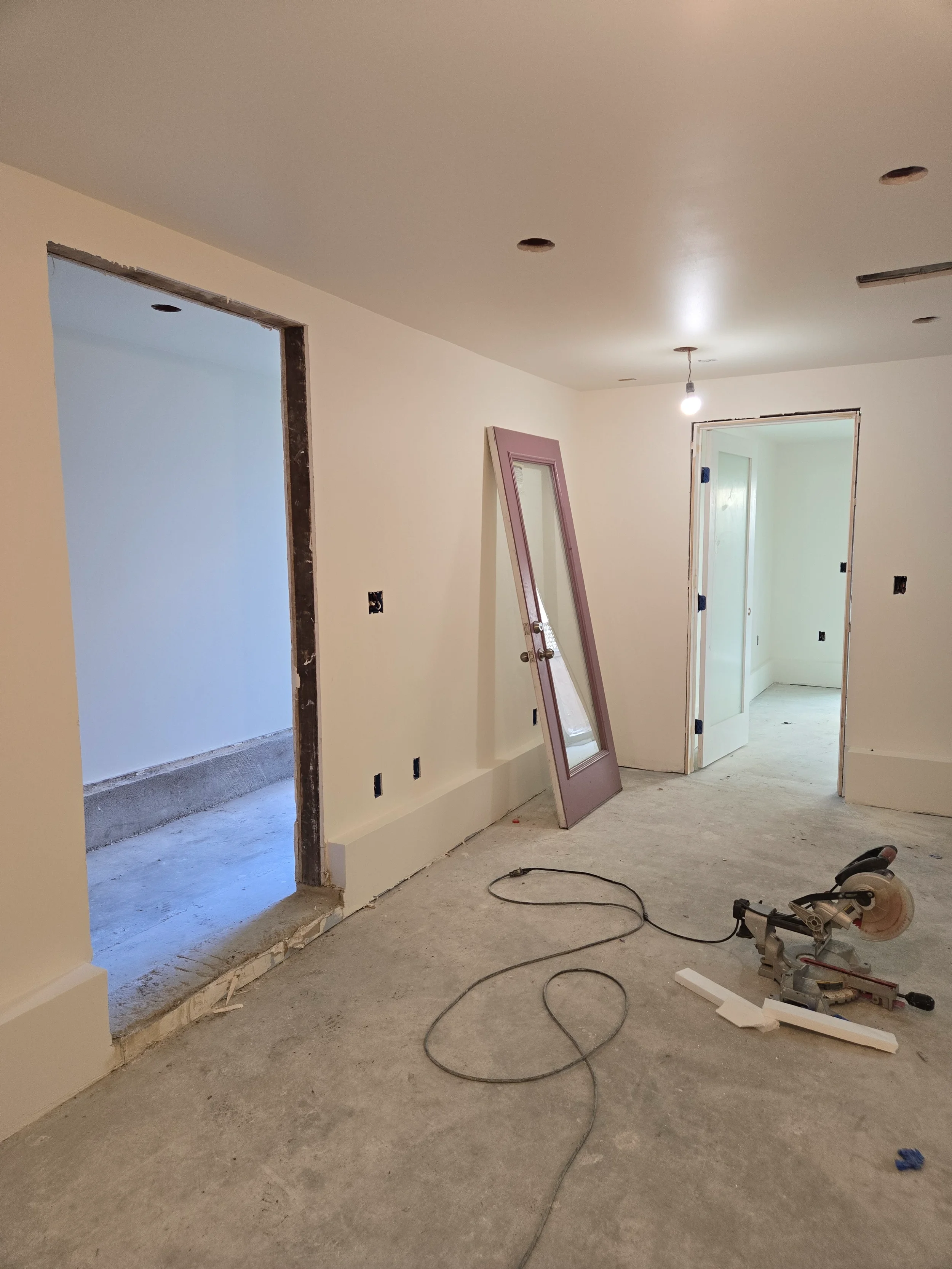 Ground-floor conversion in progress with interior demo, prep work, and unfinished flooring — San Francisco Bay Area general contractor