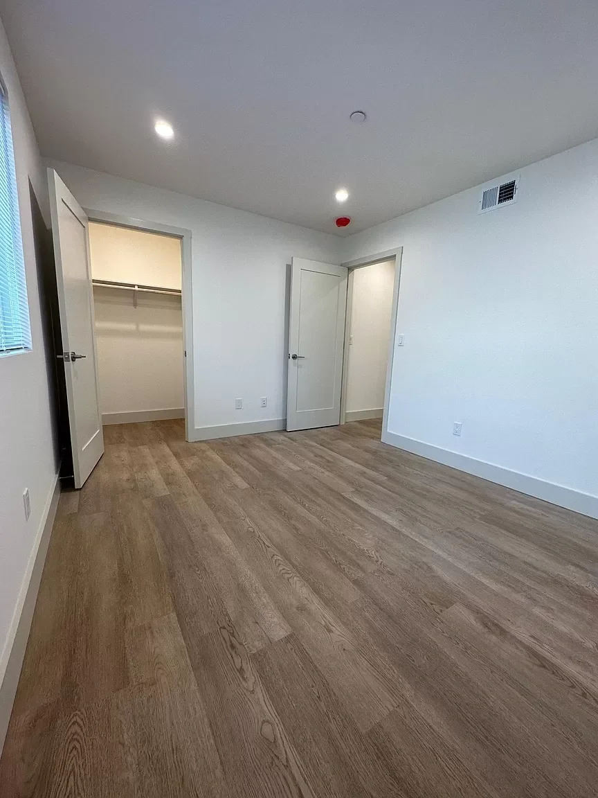 Two-story detached ADU main living space with recessed lighting and open layout — San Francisco Bay Area general contractor