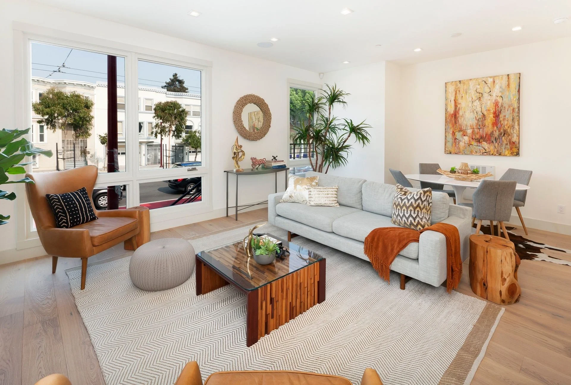 Open-concept condo renovation connecting kitchen, dining, and living areas — San Francisco Bay Area general contractor