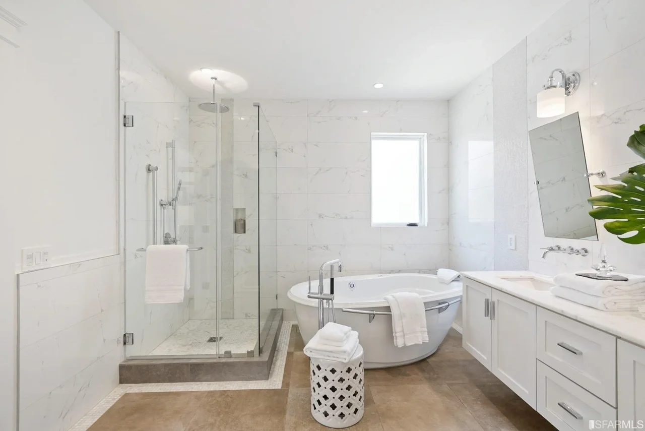 Spa-style bathroom renovation with soaking tub and bright finishes — San Francisco Bay Area general contractor.