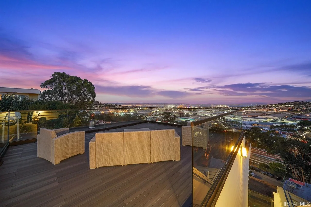 Sunset view from rooftop deck built as part of a Bay Area home addition — San Francisco Bay Area general contractor