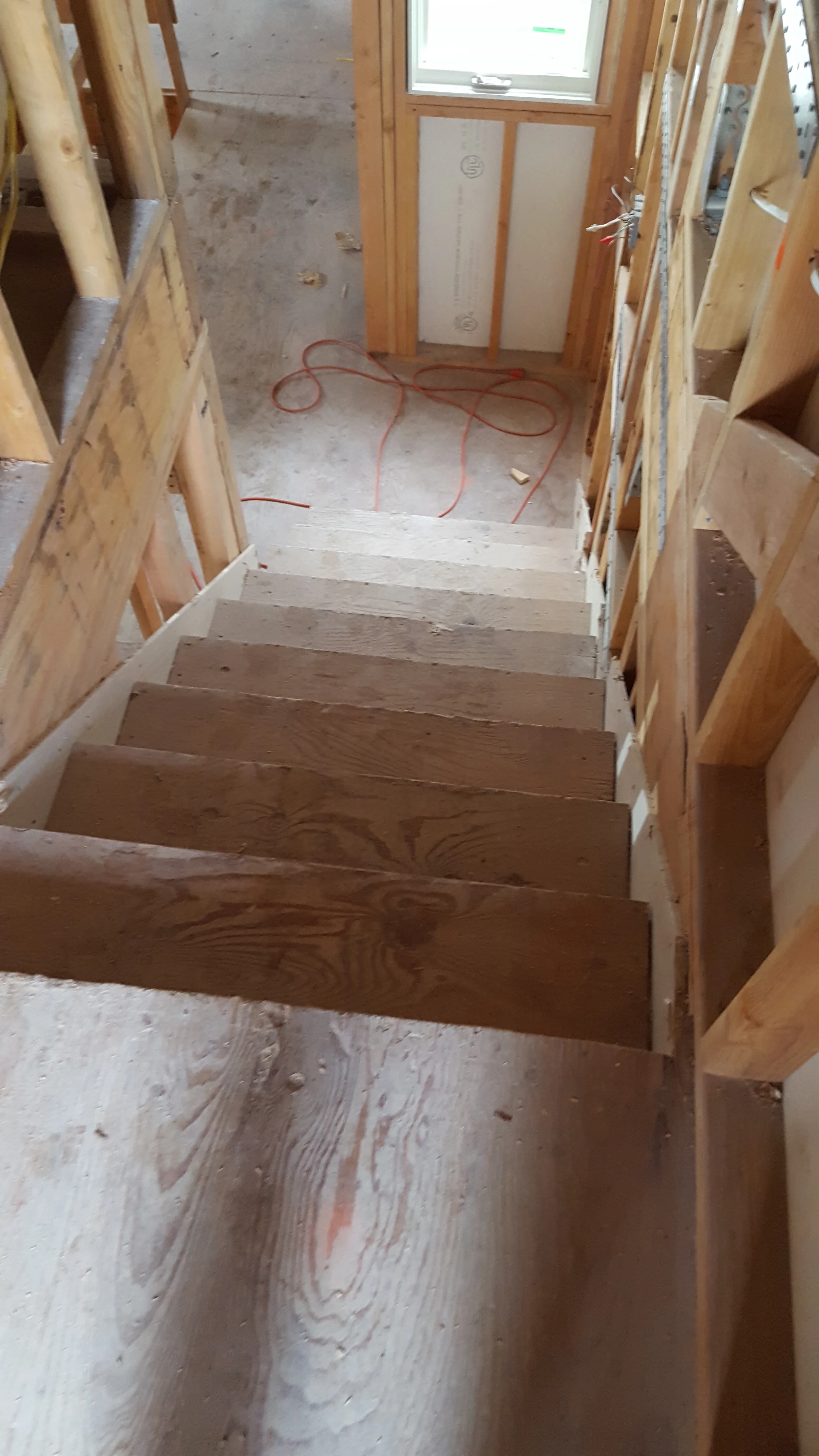 Interior framing and subfloor work during condominium renovation — San Francisco Bay Area general contractor