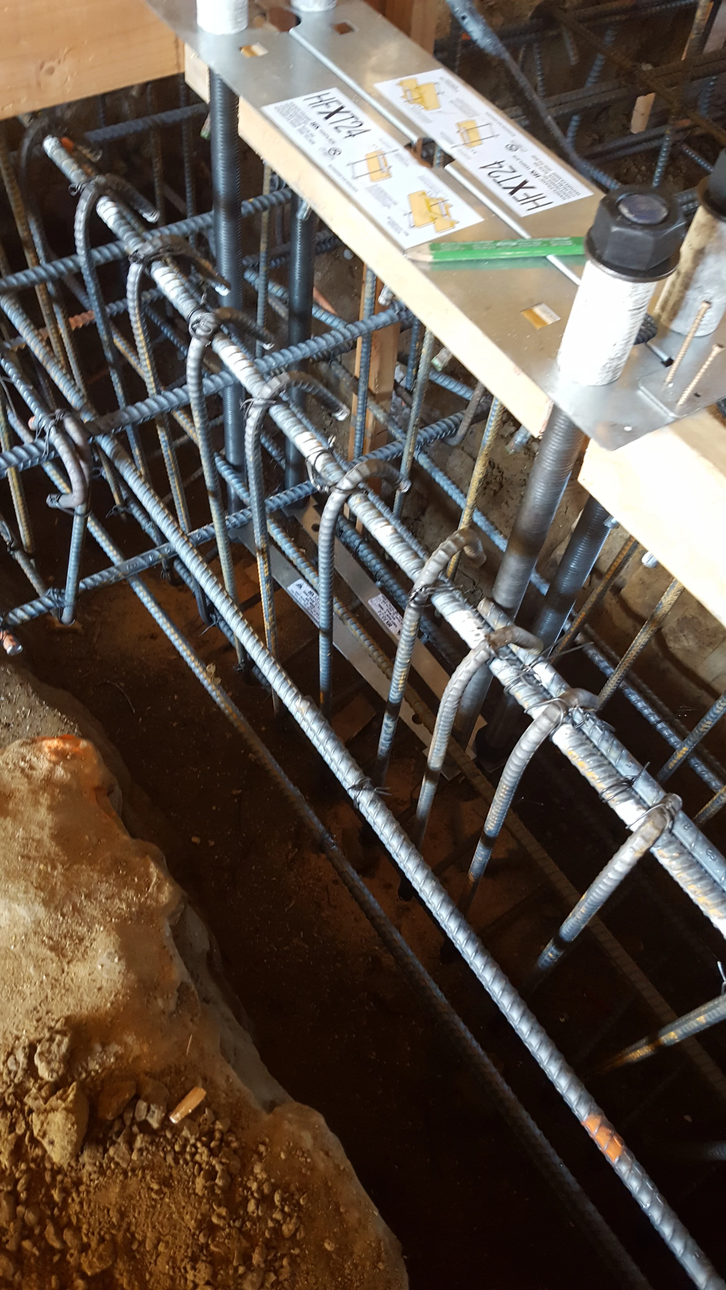 Close-up of steel rebar reinforcement for concrete footings — San Francisco Bay Area general contractor