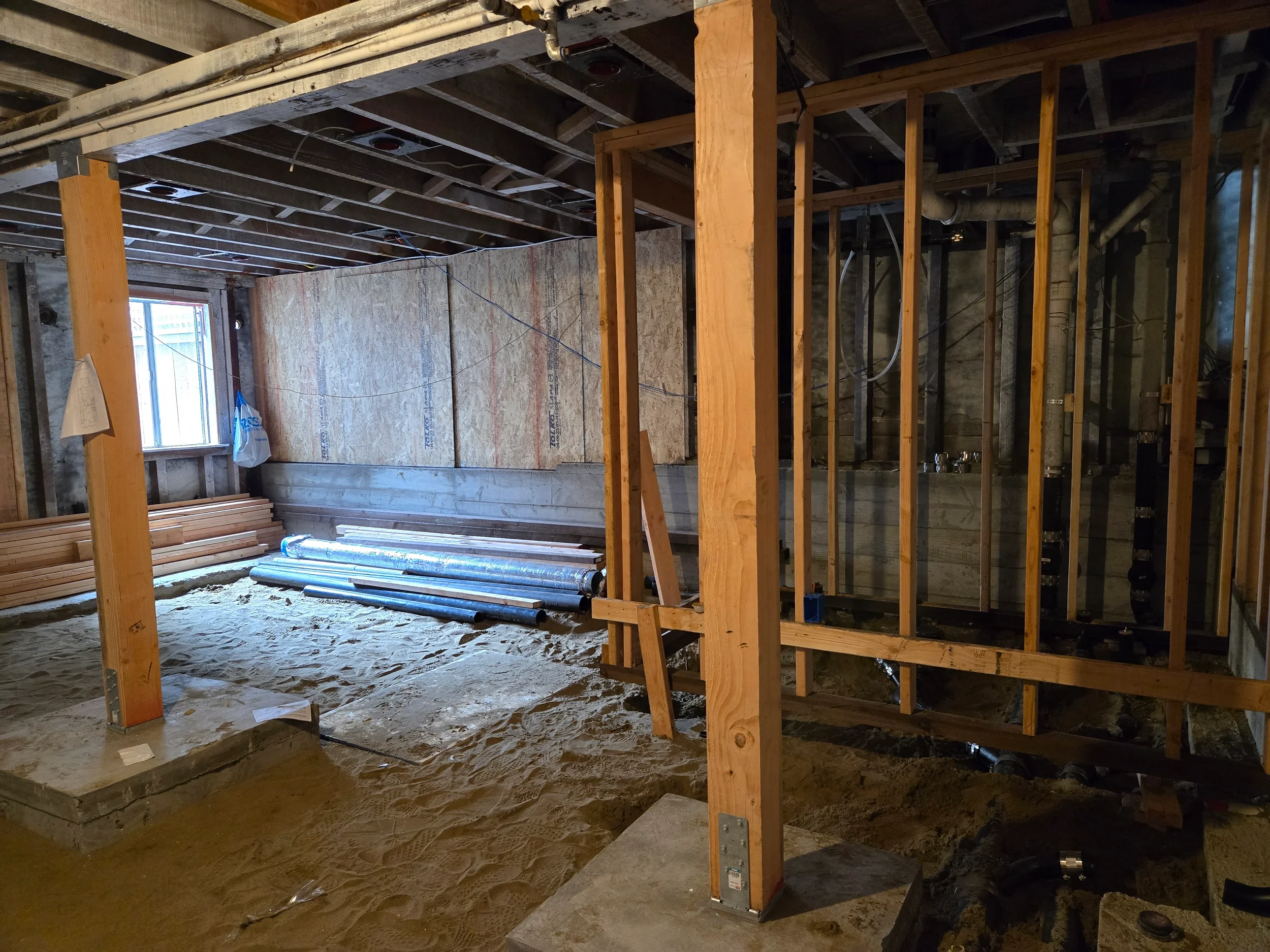 Crawlspace framing progress with new partitions and support members — San Francisco Bay Area general contractor