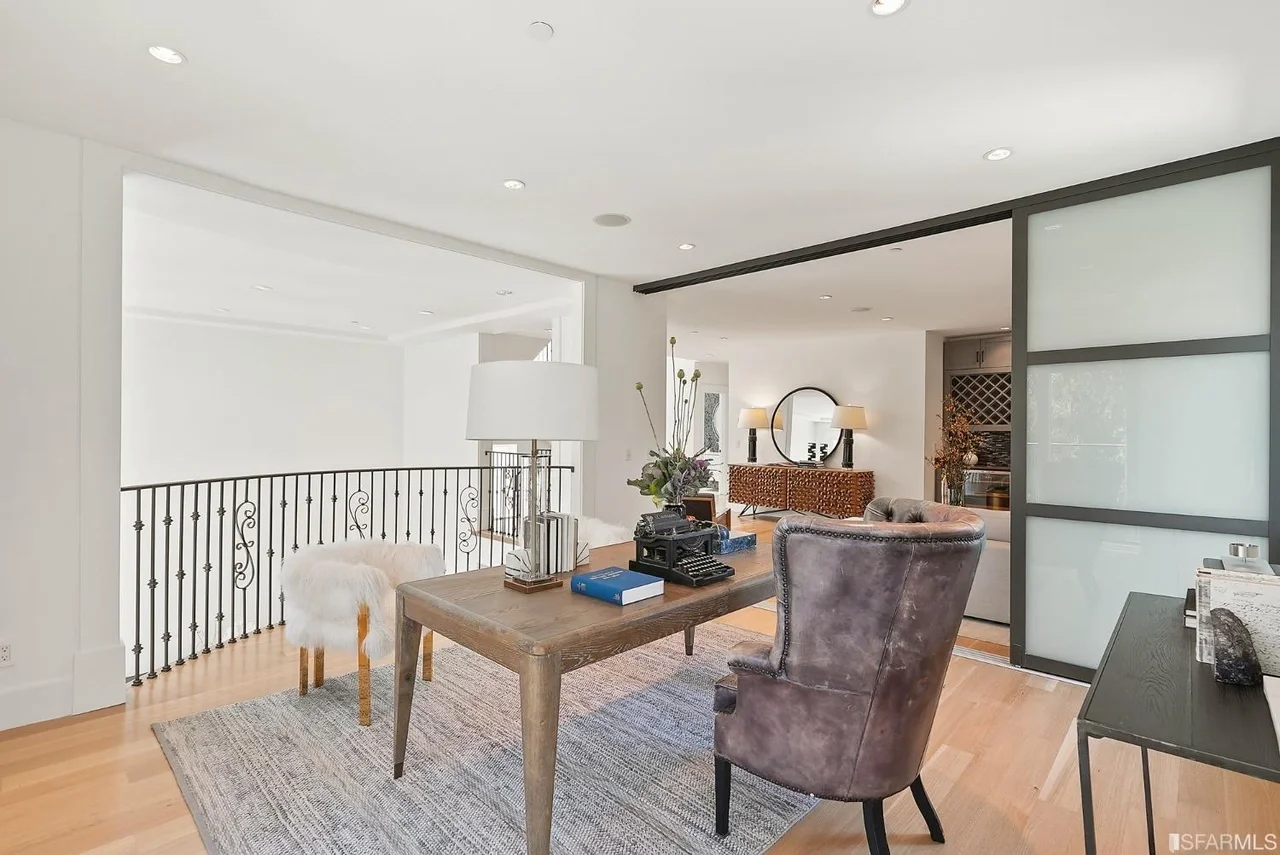 Living room remodel with modern finishes and stair landing view — San Francisco Bay Area general contractor.