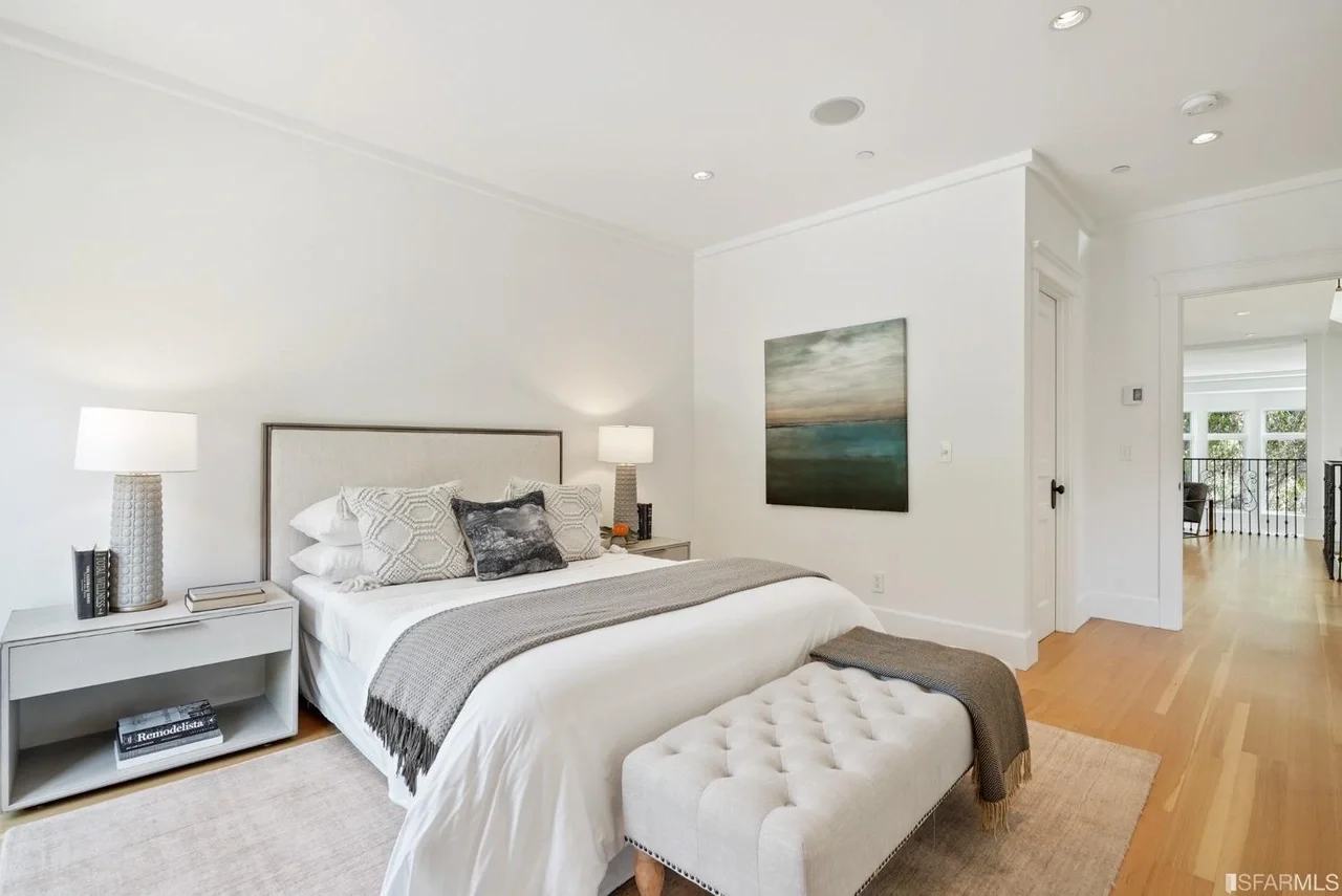 Updated bedroom with modern trim and bright natural light — San Francisco Bay Area general contractor.