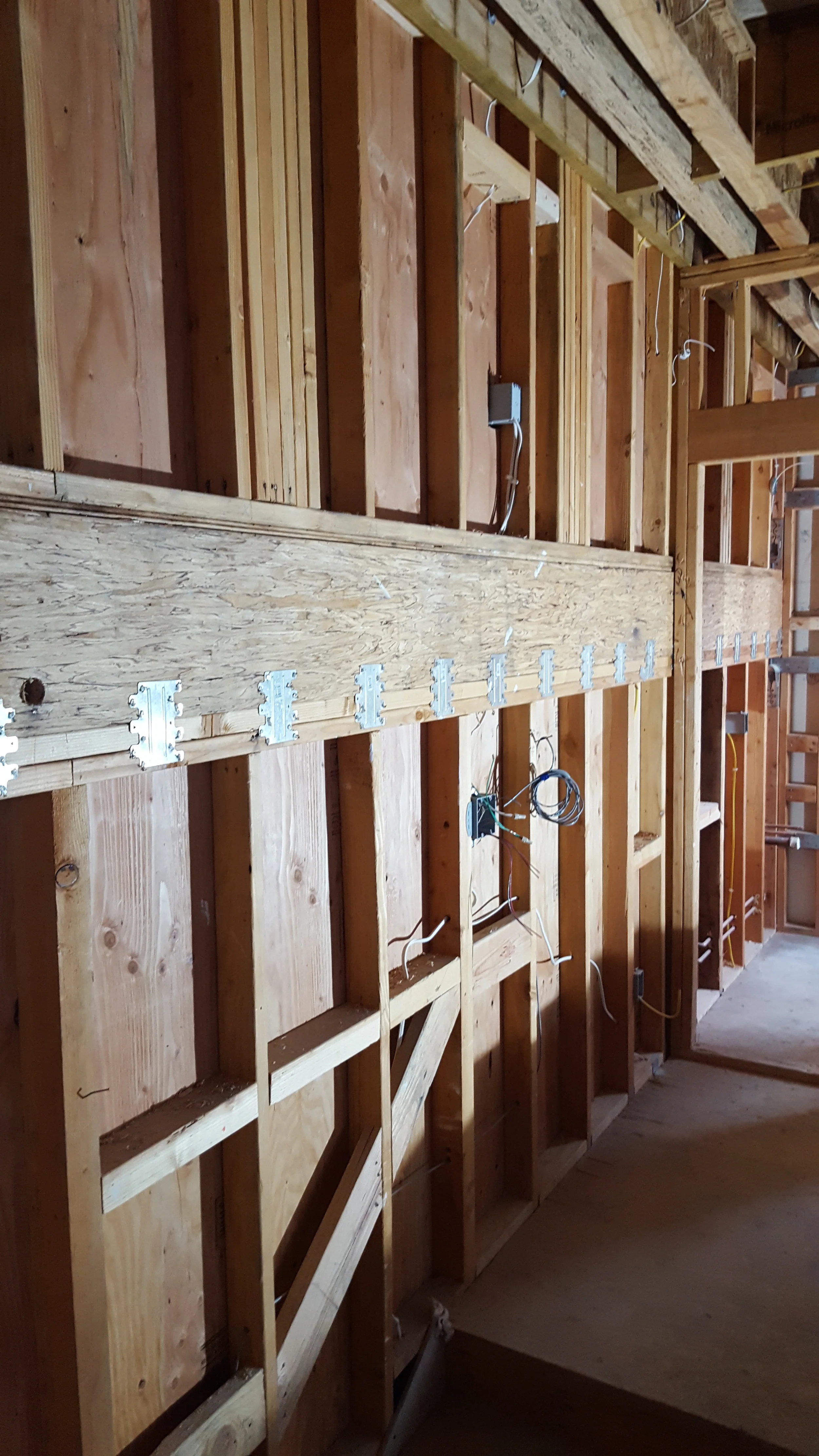 Structural framing detail with beam and studs during renovation — San Francisco Bay Area general contractor