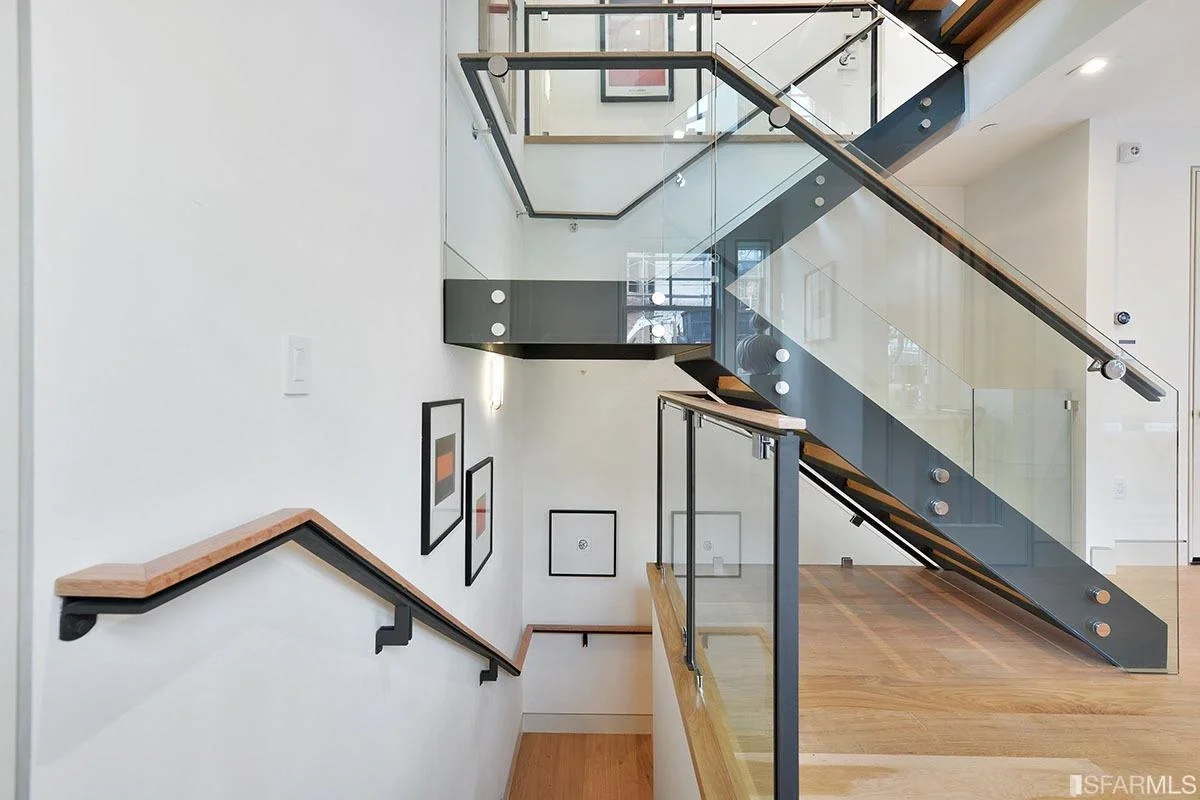 open stair detail with modern railing and wood steps — San Francisco Bay Area general contractor