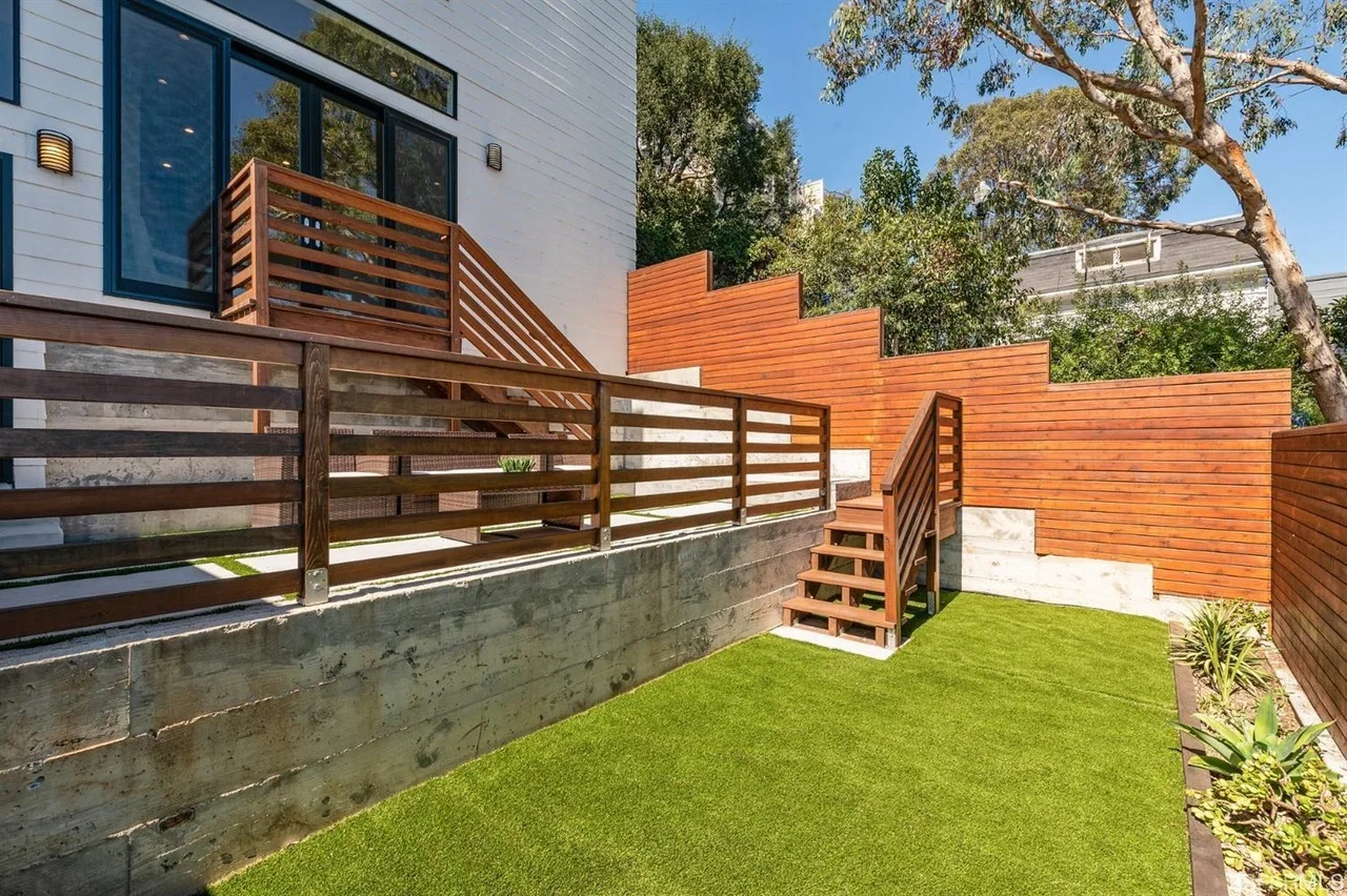 Landscaped side yard with wood fencing as part of home addition project — San Francisco Bay Area general contractor