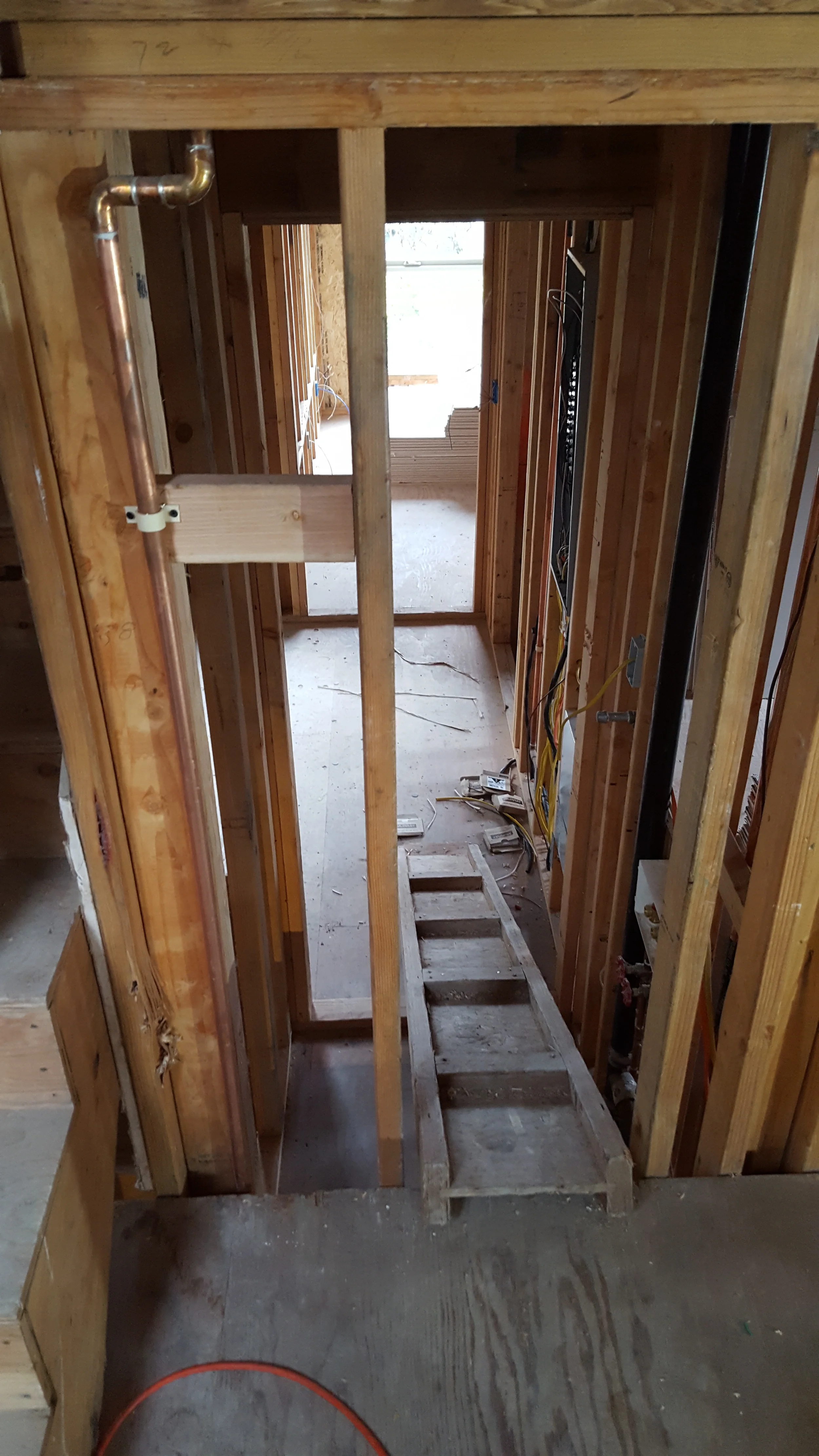 Framed hallway and stair opening during condominium remodel — San Francisco Bay Area general contractor