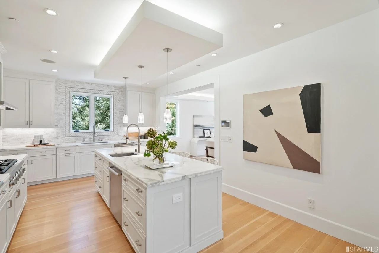 Open-plan kitchen remodel connecting seamlessly to dining and living spaces, open-plan kitchen renovation connecting to dining and living — San Francisco Bay Area general contractor.