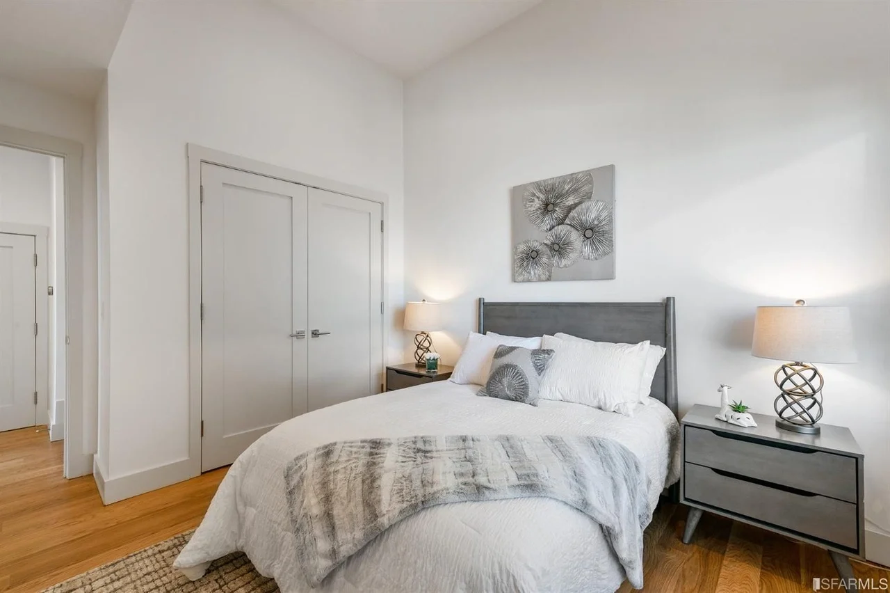 Bedroom addition with closet doors and wide-plank flooring — San Francisco Bay Area general contractor