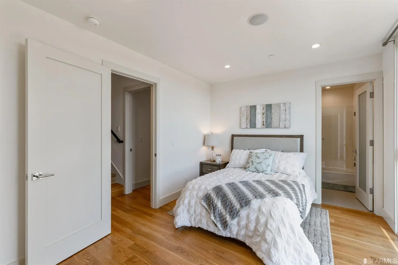 Bedroom hallway in vertical addition with modern doors and hardwood floors — San Francisco Bay Area general contractor