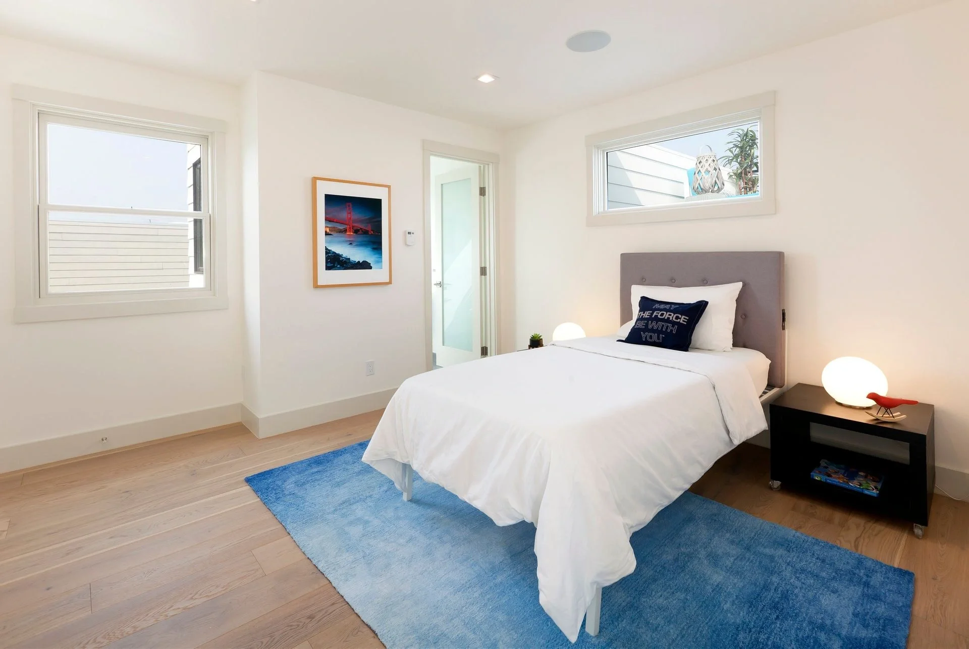 Bedroom update in San Francisco Bay Area condo with neutral bedding, recessed lighting, and fresh finishes — general contractor